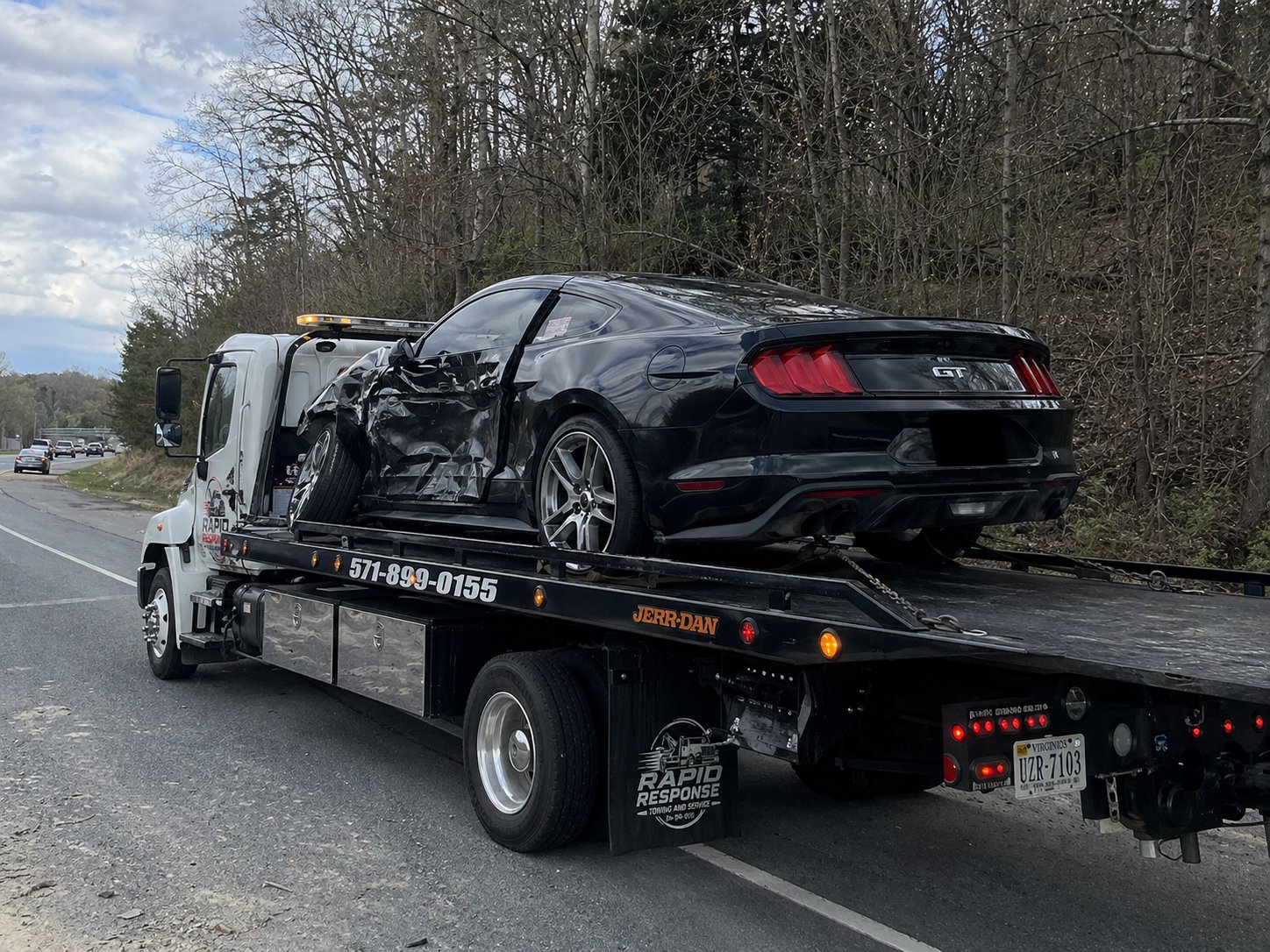 Rapid Response Towing recovering a Mustang GT